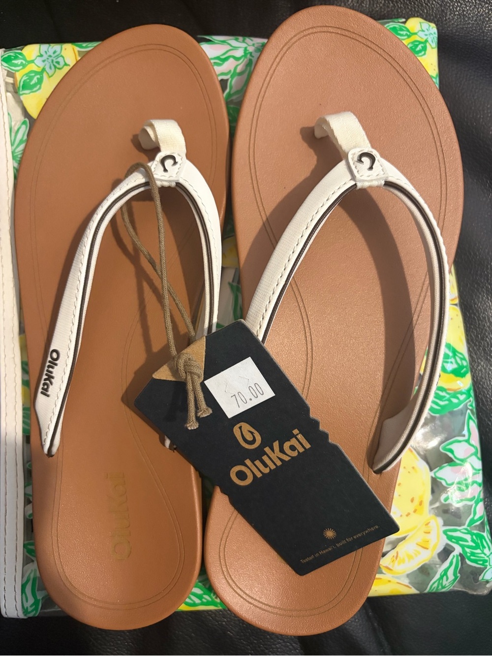 OluKai Women’s White and Tan Thong Sandals